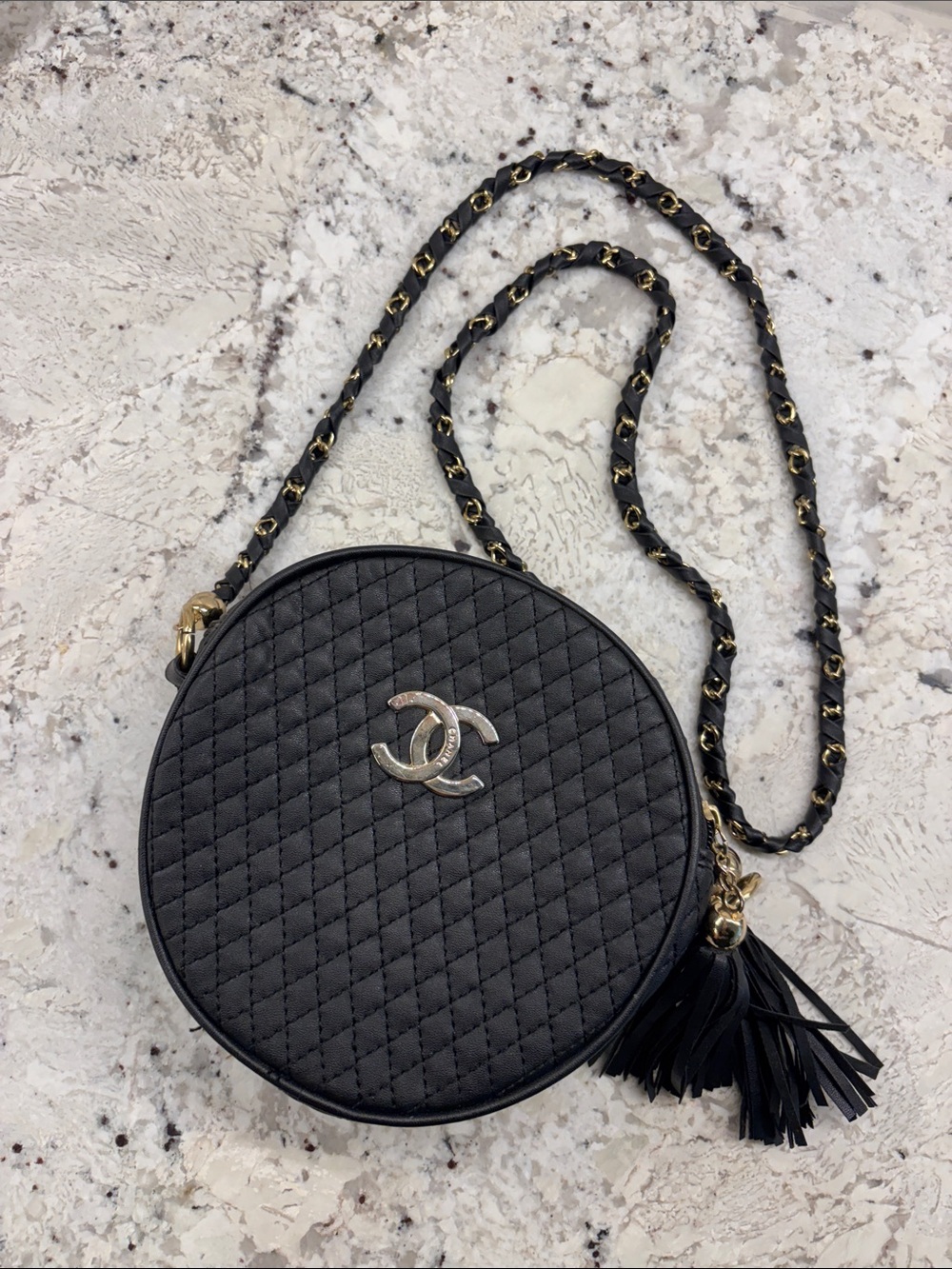 Black and gold quilted round crossbody